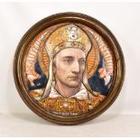 W. B. SIMPSON & SON; an Arts & Crafts enamelled circular plaque inscribed 'Sanctus Martinus (St.