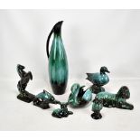 A group of Canadian Blue Mountain figures of animals, and a vase, height 47cm (8).