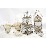 A group of garden ornaments including a three tiered stand, an ornamental bicycle basket, etc (6).