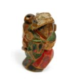 GYUKA; a 19th century Japanese carved wooden netsuke of a tea picker with child upon her back,