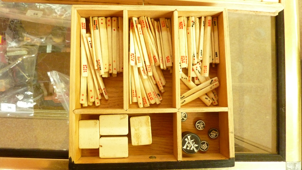 A Chinese Mah-Jong set with bone and bamboo tiles in wooden case and a rule set.Additional - Image 4 of 5