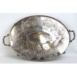 A Victorian silver plated twin handled oval galleried tea tray with engraved detail, length 71.5cm.