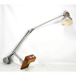 ADMEL; a Fingalite angle poise lamp with wooden mounted brackets.