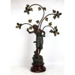 A decorative spelter table lamp, height 78cm.
