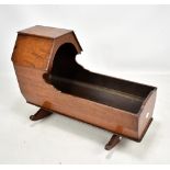 A 19th century oak rocking cradle, length 45.5cm.