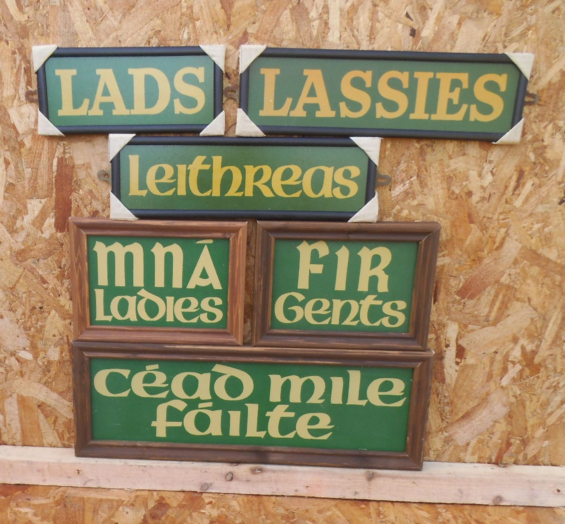 Six Irish themed wooden bar signs.