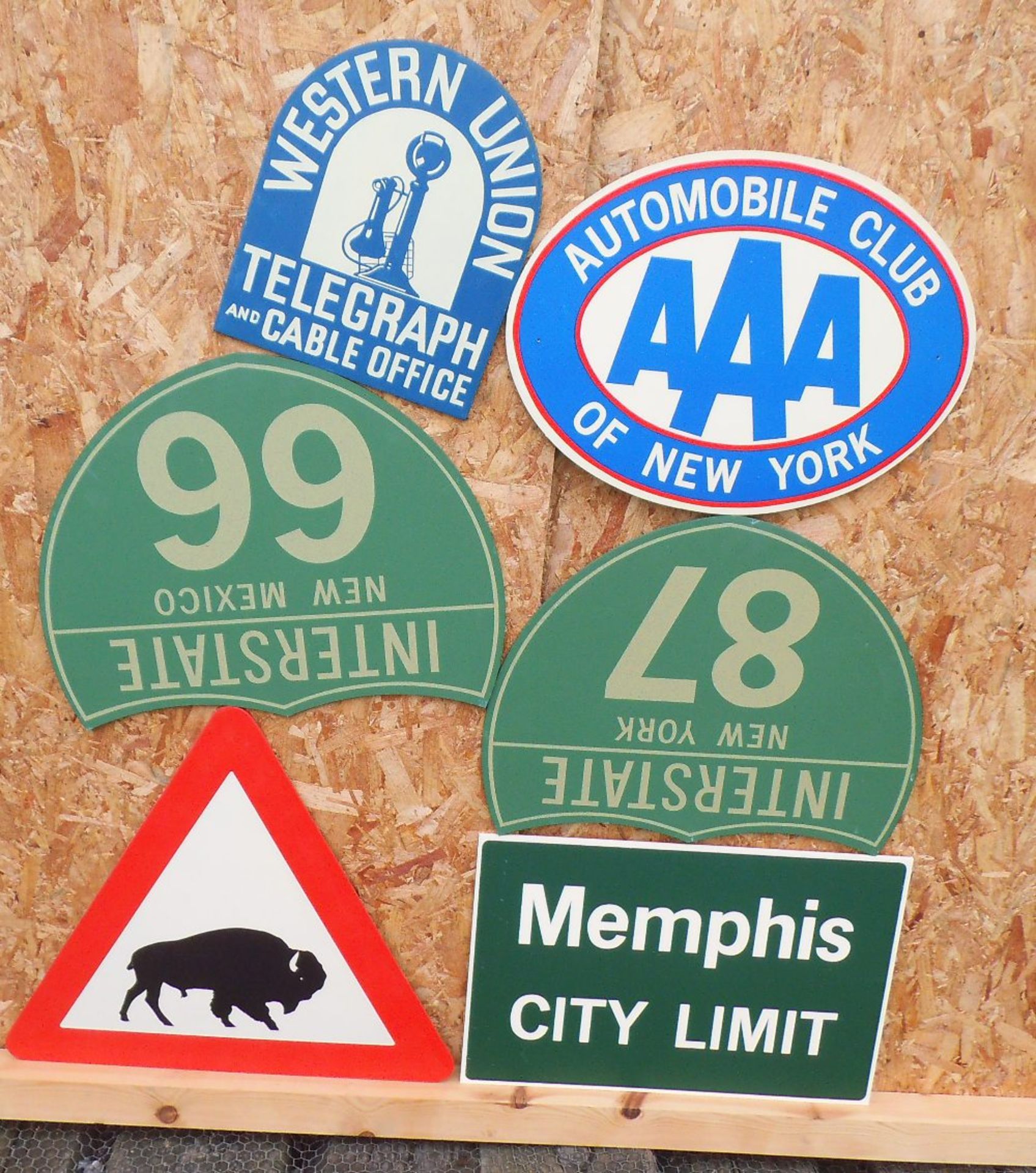 Six reproduction wooden American highway signs, '87' 60 x 49cm.