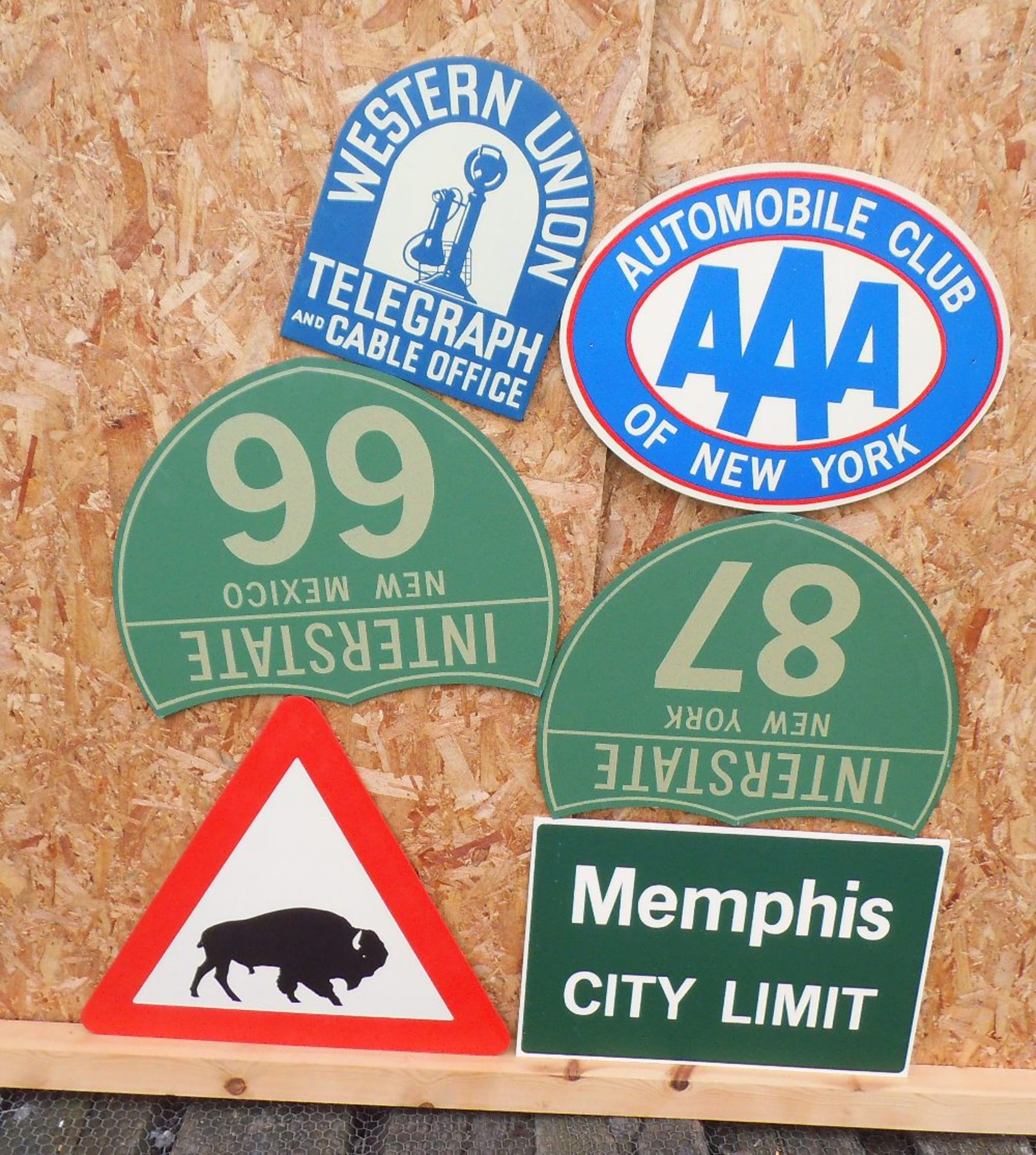 Six reproduction wooden American highway signs, '87' 60 x 49cm.