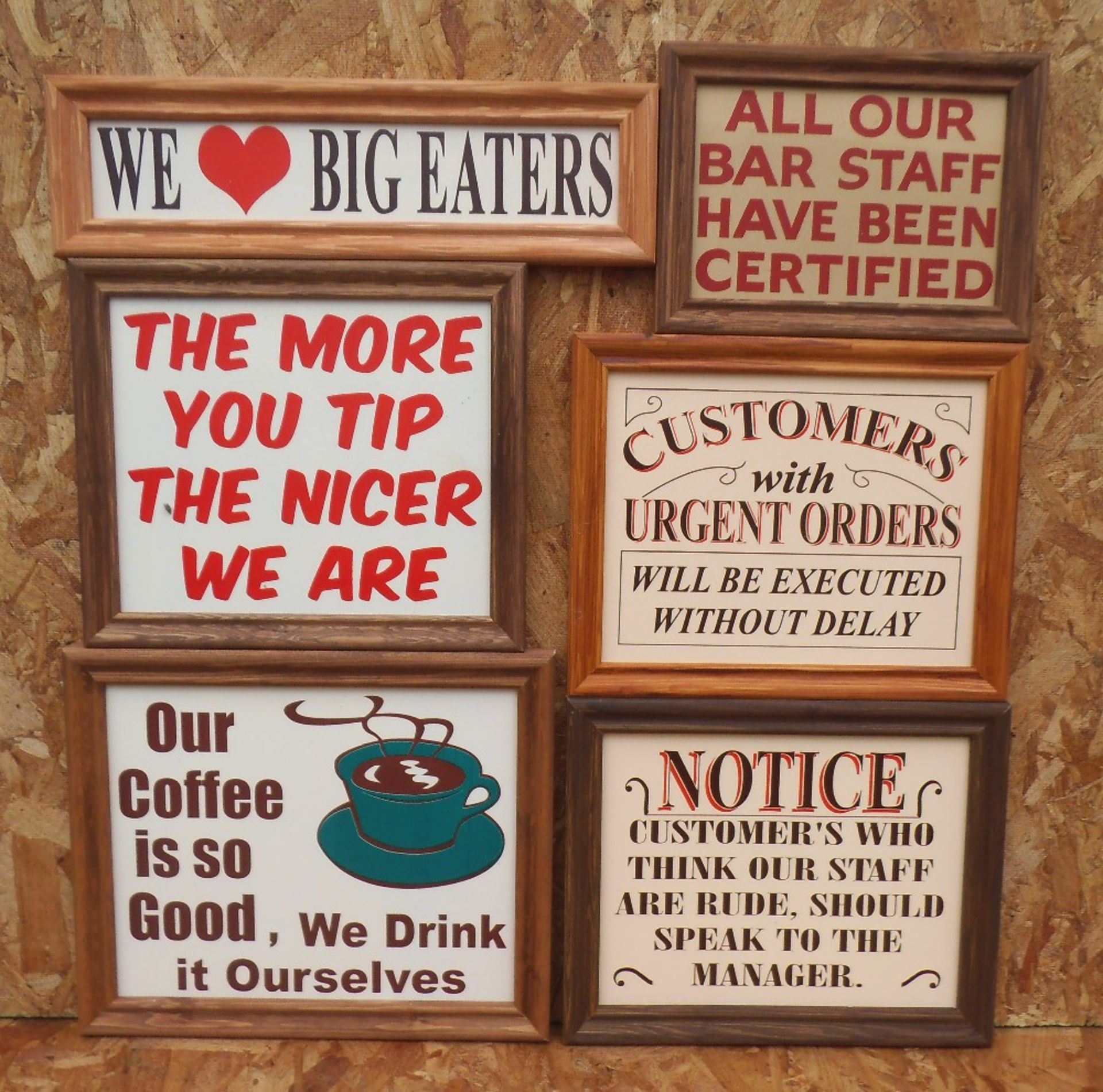 Six humorous wooden bar signs, framed, “staff are rude” width 35cm.