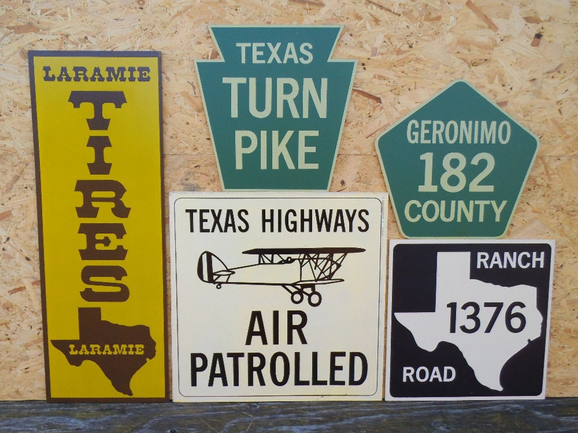 Five reproduction wooden signs, Air Patrol 52 x 52cm.