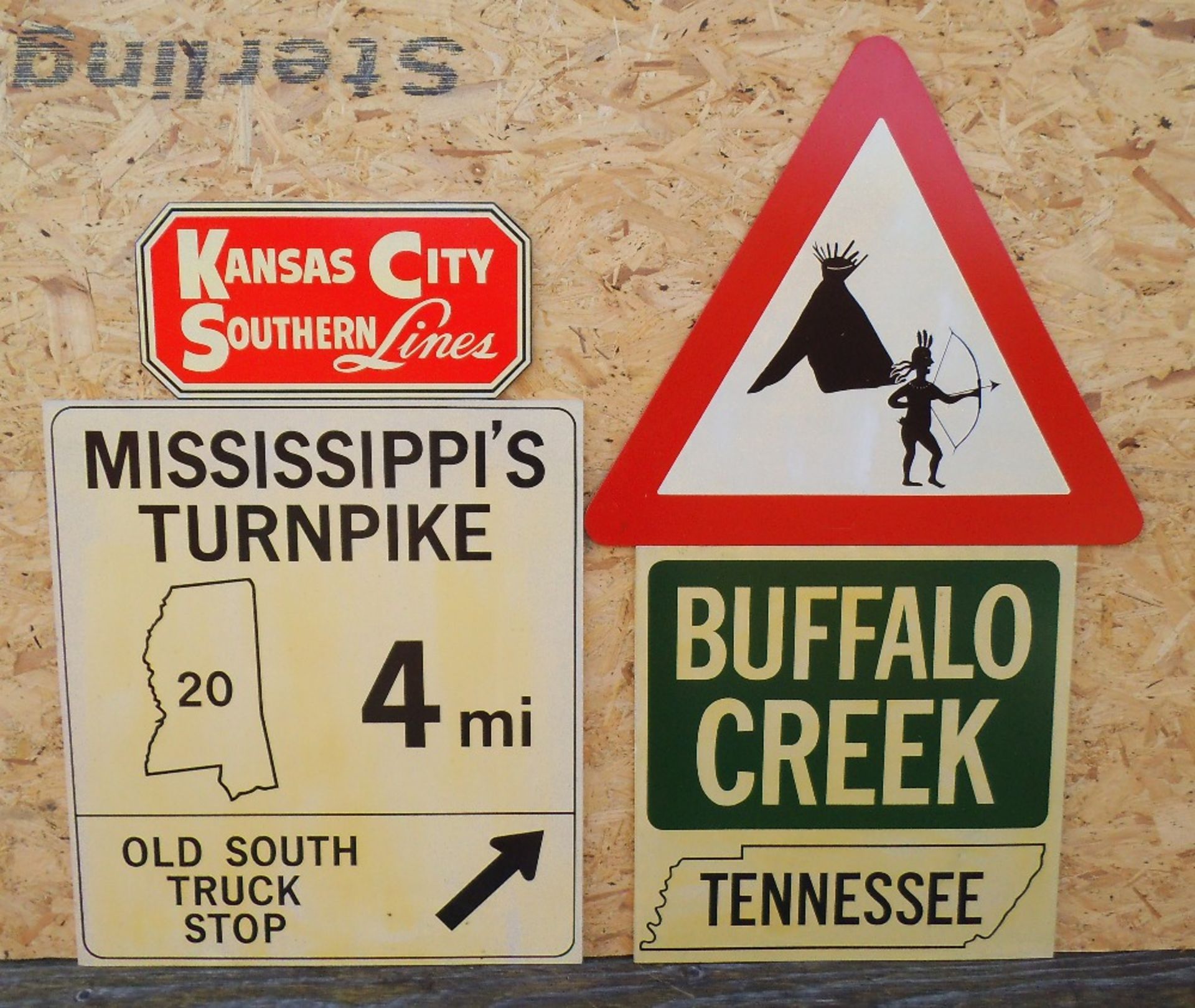 Four reproduction wooden signs, Mississippi width 60cm.