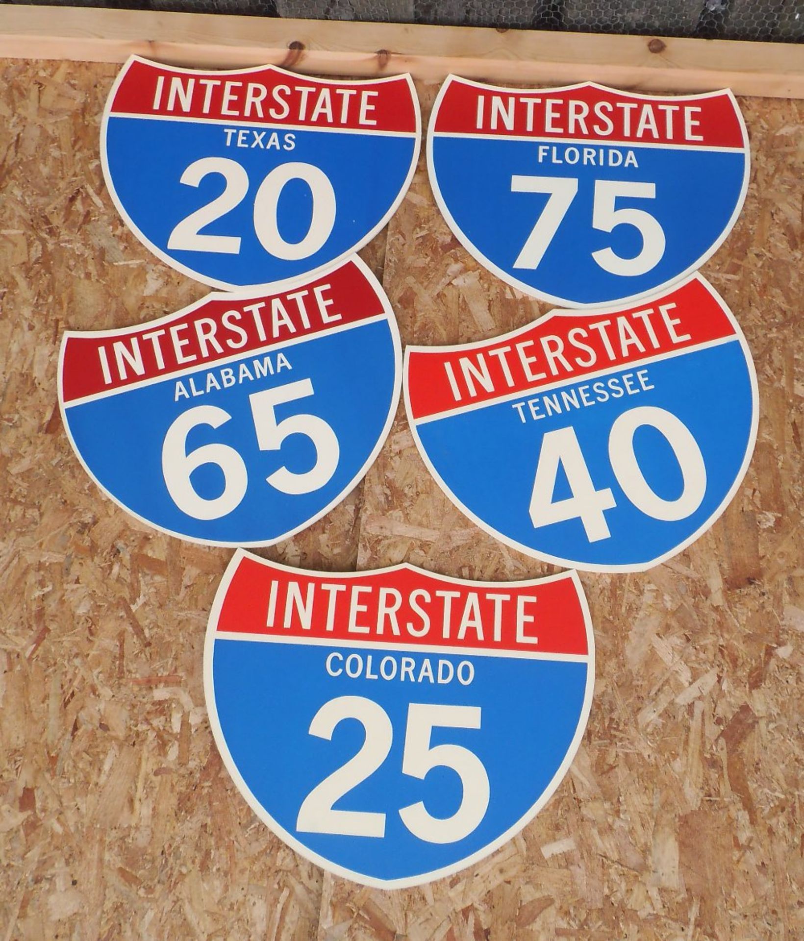 Five reproduction wooden American Interstate signs, 60 x 49cm.
