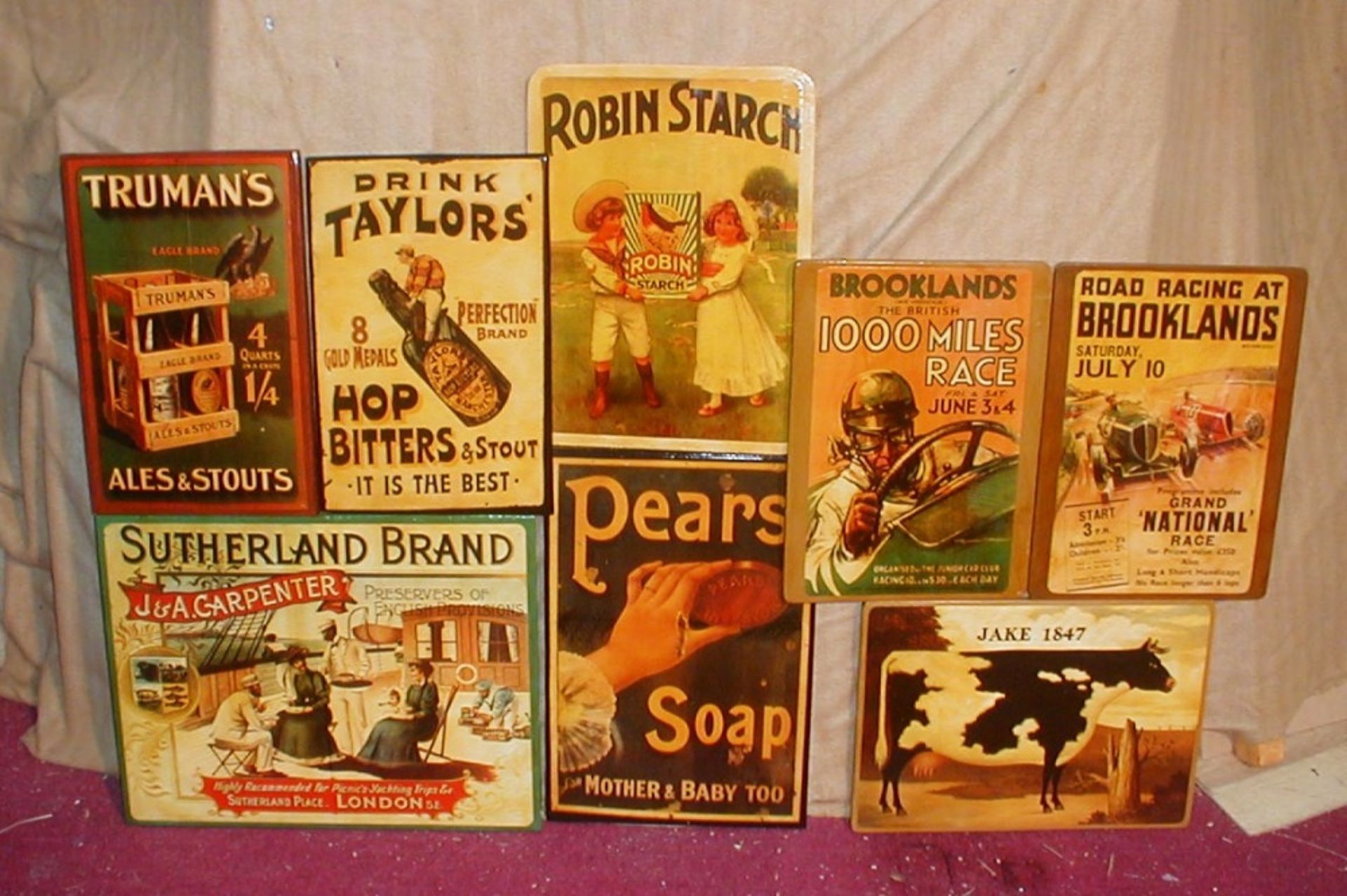 Eight wooden reproduction advertising signs, most 30 x 42cm (8).