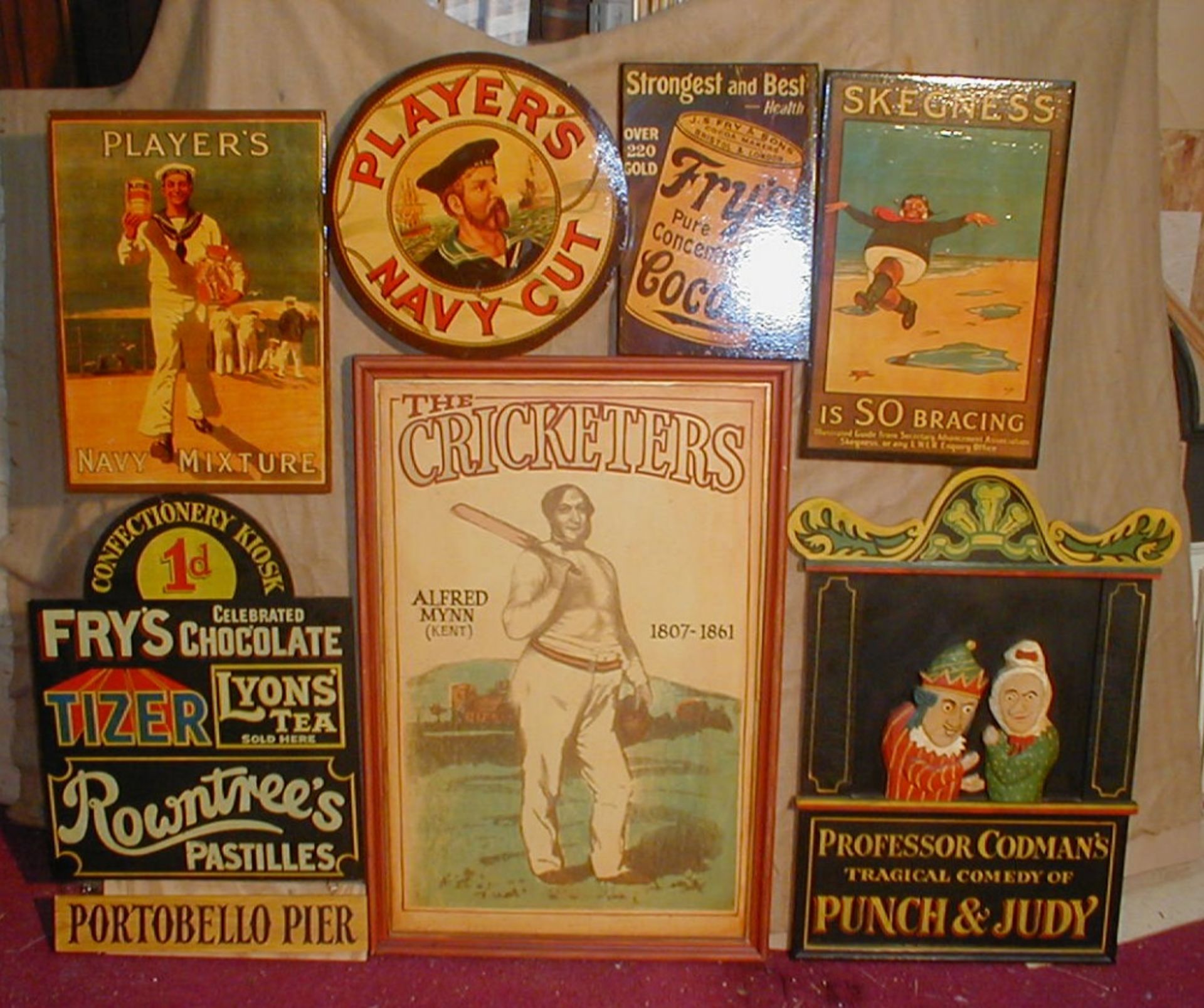 Seven wooden reproduction English old fashioned signs. Size guide ‘Punch and Judy’ 57 x 78cm.