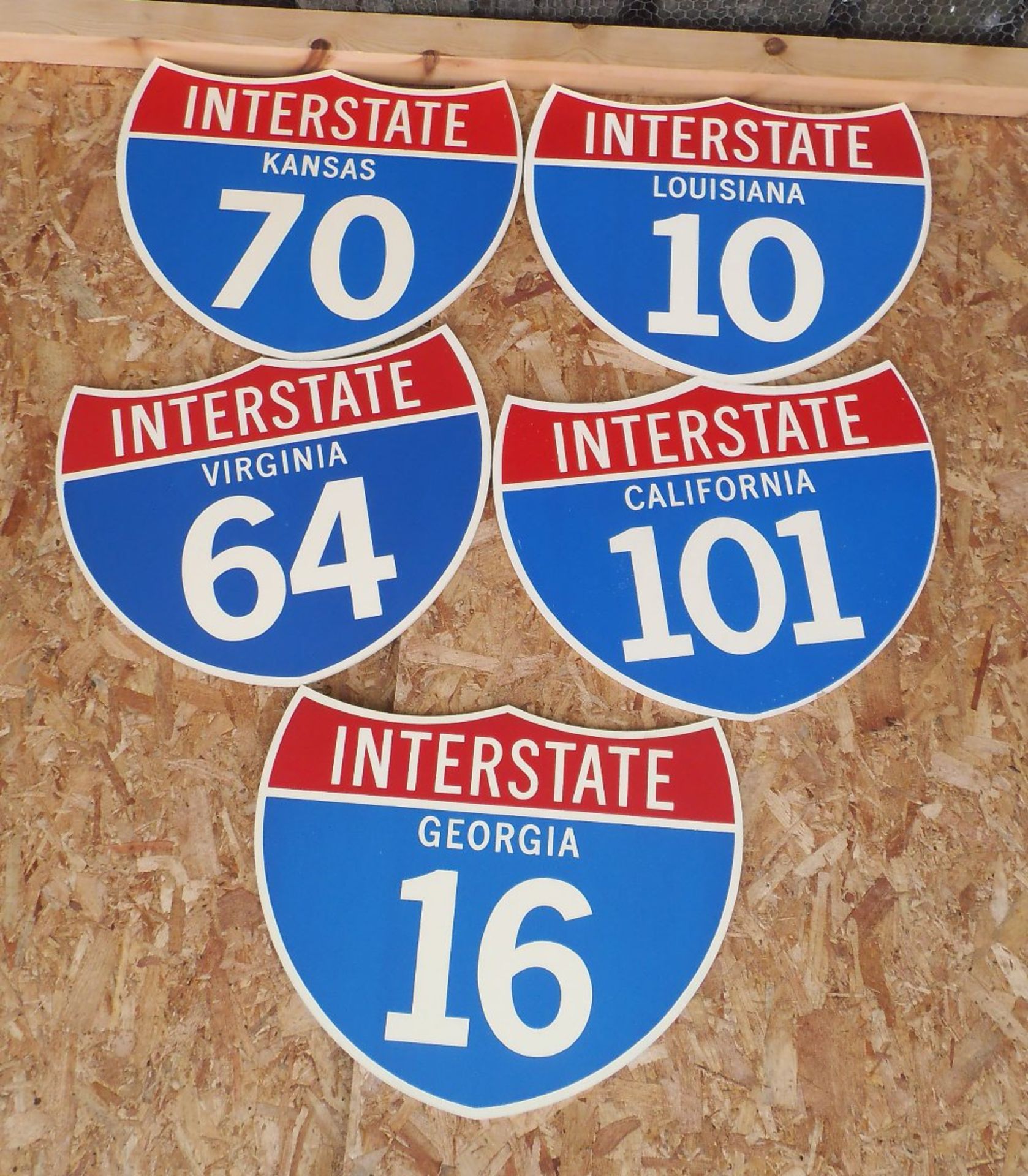 Five reproduction wooden American Interstate signs, 60 x 49cm.