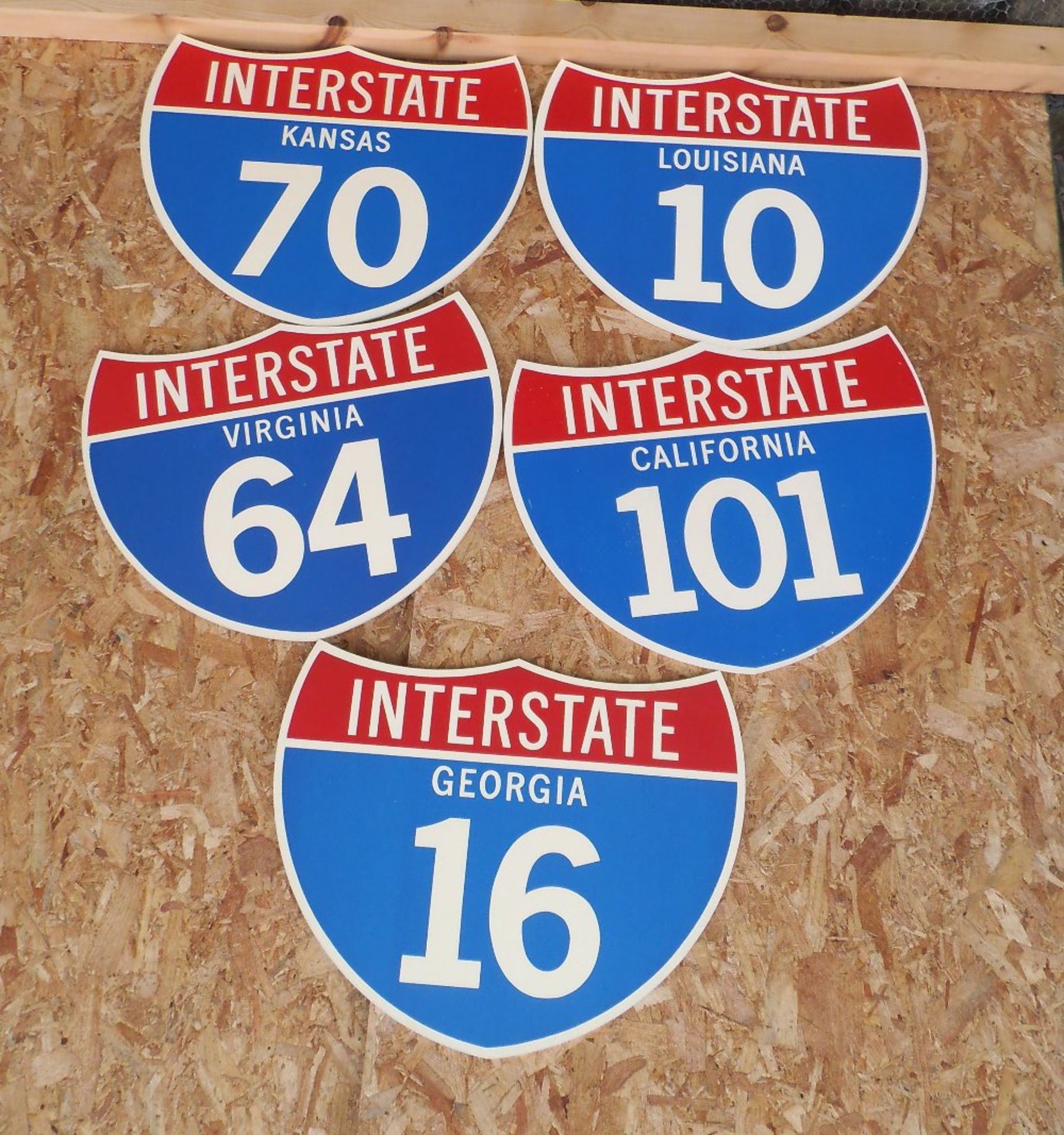 Five reproduction wooden American Interstate signs, 60 x 49cm.