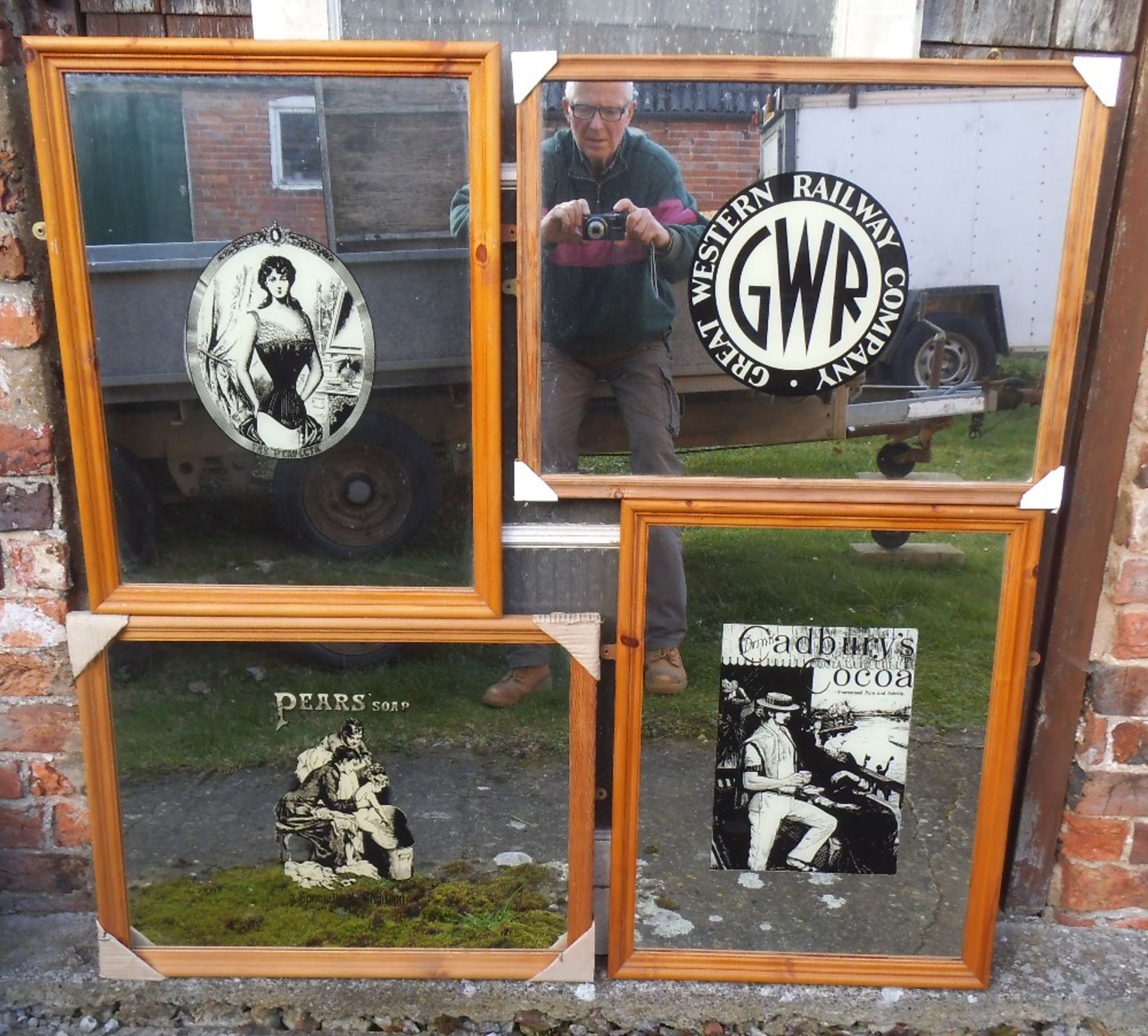 Four reproduction pub style advertising mirrors, 67 x 51 cm.