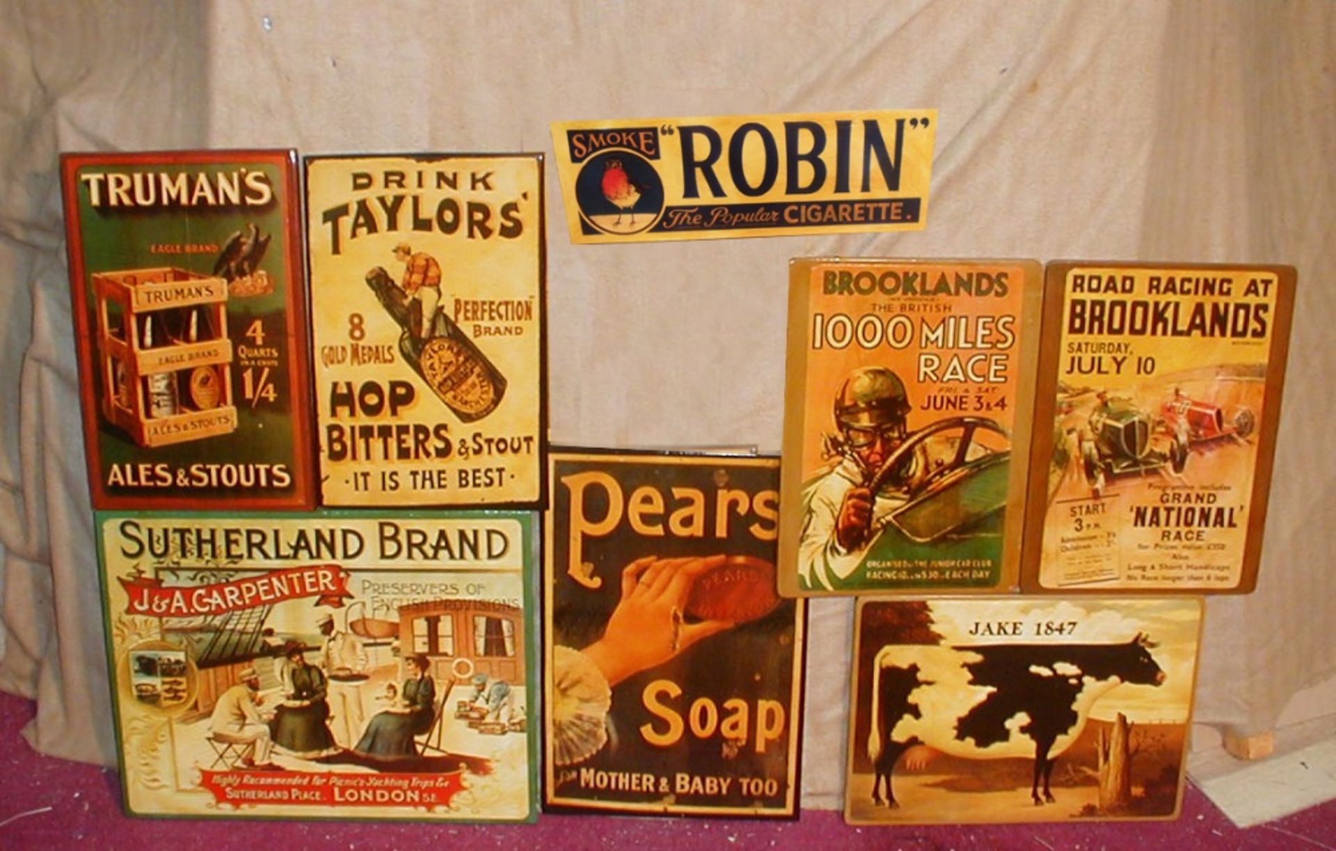 Eight wooden reproduction advertising signs, most 30 x 42cm (8).