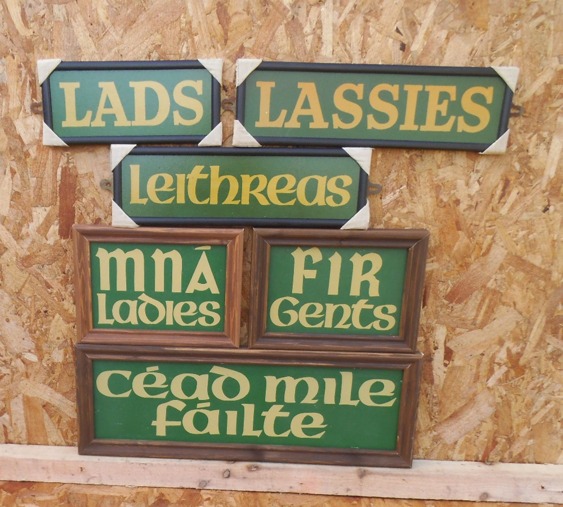 Six Irish themed wooden bar signs.