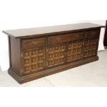 A contemporary oak Spanish-style sideboard,