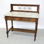 A Victorian red walnut tile-back marble-topped wash stand with two frieze drawers,