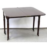 An early/mid-20th century oak drop-leaf gate-leg side table on wrythen supports and