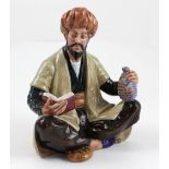 Royal Doulton; a figure HN2247 'Omar Khayyam', height approx 17cm.