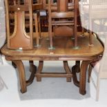 A French walnut Art Deco draw-leaf table (lacking leaves), length 138.