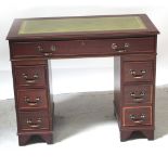 A children's mahogany reproduction box-top pedestal desk with green tooled leather, width 91.5cm.