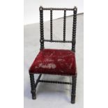 A Victorian mahogany bobbin chair with ivory finials to the back rail and a 19th century provincial