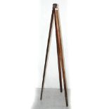 A vintage mahogany and brass theodolite stand, length 145cm.