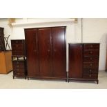 A contemporary Stag mahogany bedroom suite comprising dressing chest,