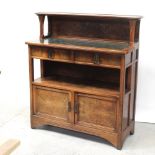 A French walnut Art Deco buffet with green marble inset to the top surmounting two frieze drawers