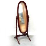 A 20th century mahogany reproduction oval cheval mirror, height approx 149cm.