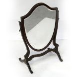 A Victorian mahogany shield-shaped swing vanity mirror, height 58cm.