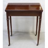 An Edward VII mahogany fold-over card table with satinwood cross-banding,