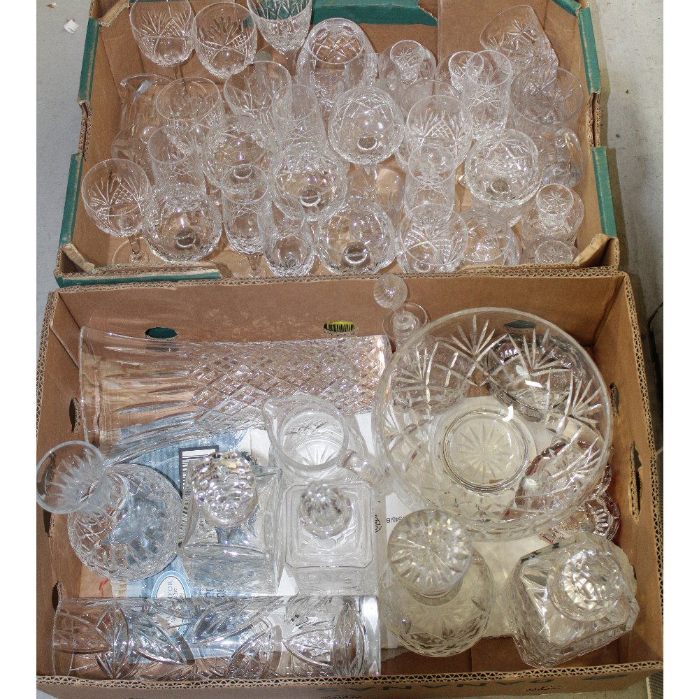 A large quantity of cut glass and lead crystal to include five various sized decanters,