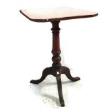 A late 19th century mahogany rectangular side table on turned column support to tripartite base,