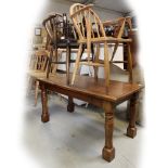 A vintage oak rectangular coffee table on turned support and block feet, length 100cm,