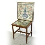 An early 20th century brass-framed leaded glass fire screen with central shield-shaped cartouche