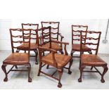 A set of six reproduction Aesthetics-style dining chairs with Cupid's bow ladder-back over