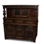 A mid/late 20th century Old Charm carved oak court cupboard,