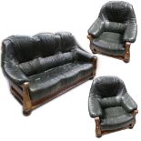 An oak-framed and green leather three-piece suite, length of sofa approx 195cm (3).