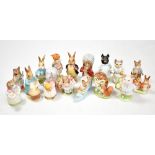 BESWICK; sixteen Beatrix Potter figures, seven with lustre back stamps comprising 'Ribby', 'The