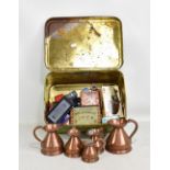 A mixed group of collectors' items including copper measures, model cars, tins, etc.