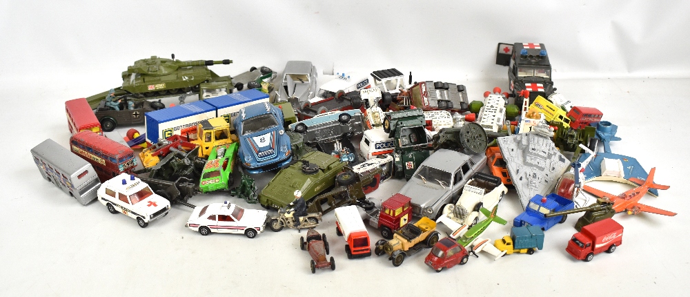 A group of loose playworn Dinky and Corgi model vehicles including emergency vehicles, Captain