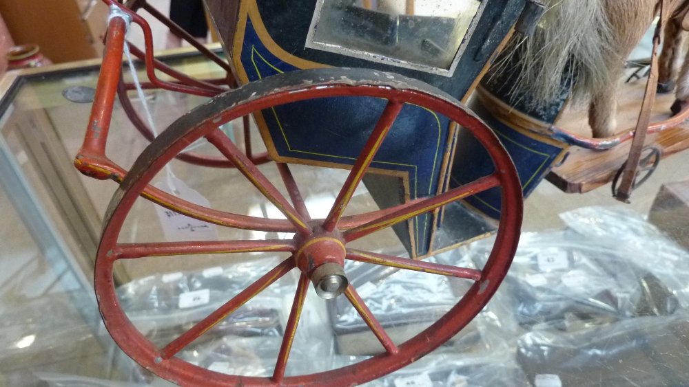 A rare 19th century horse drawn German coach, the tin painted coach set with eight spoke wheels - Bild 2 aus 9