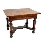 An early 19th century Dutch walnut marquetry inlaid centre table with profusely floral bird and