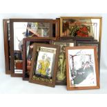 A group of fifteen modern reproduction advertising wall mirrors mainly relating to fashion and