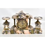 A three piece stained alabaster and onyx clock garniture, the clock of architectural form with